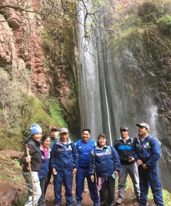 Employees-of-Willka-T'ika-at-waterfall-Peru-by-Art-In-Voyage-Wellness Retreat | The Year of Wellness Travel is Upon Us