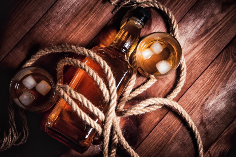 Glass of whiskey with rope, by Art In